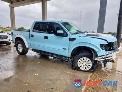 Czwarte zdjęcie samochodu z boku: 2014 FORD F150 SVT RAPTOR VIN:1FTFW1R62EFC62919 - miniatura