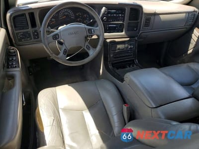 Zdjęcie 8 z 14 samochodu: 2005 GMC YUKON XL DENALI VIN:1GKFK66U25J115674 - miniatura