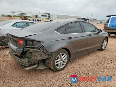 Trzecie zdjęcie samochodu z tyłu: 2016 FORD FUSION SE VIN:3FA6P0H7XGR356740 - miniatura