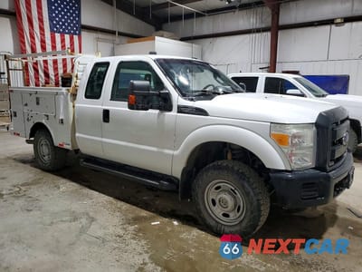 Czwarte zdjęcie samochodu z boku: 2014 FORD F250 SUPER DUTY UTILITY / SERVICE TRUCK VIN:1FT7X2B62EEA27539 - miniatura