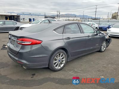 Trzecie zdjęcie samochodu z tyłu: 2017 FORD FUSION SE HYBRID VIN:3FA6P0LU5HR164835 - miniatura