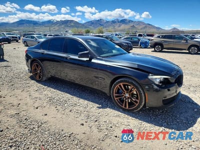 Czwarte zdjęcie samochodu z boku: 2012 BMW 740 I VIN:WBAKA4C51CDS99402 - miniatura