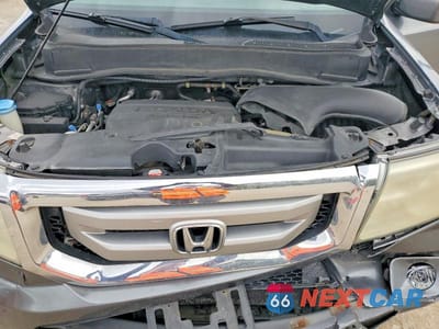 Zdjęcie 12 z 13 samochodu: 2011 HONDA PILOT EX VIN:5FNYF4H40BB089749 - miniatura