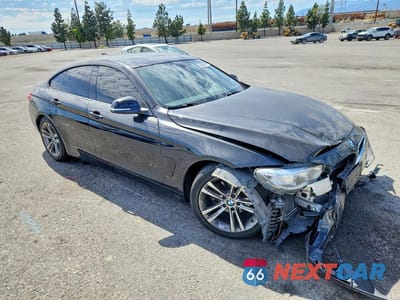Czwarte zdjęcie samochodu z boku: 2015 BMW 428 I GRAN COUPE SULEV VIN:WBA4A9C53FGL87084 - miniatura