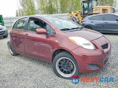 Czwarte zdjęcie samochodu z boku: 2010 TOYOTA YARIS BASE VIN:JTDKT4K36A5296015 - miniatura