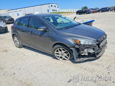 Czwarte zdjęcie samochodu z boku: 2015 FORD FOCUS SE VIN:1FADP3K2XFL344879 - miniatura