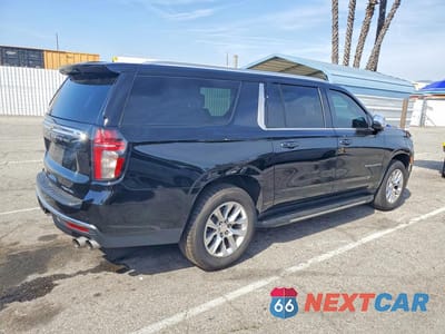 Trzecie zdjęcie samochodu z tyłu: 2023 CHEVROLET SUBURBAN C1500 PREMIER VIN:1GNSCFKD0PR354813 - miniatura