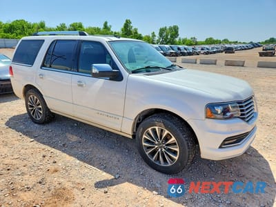 Czwarte zdjęcie samochodu z boku: 2015 LINCOLN NAVIGATOR VIN:5LMJJ2JTXFEJ15232 - miniatura