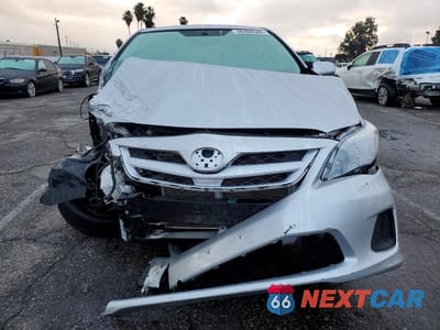 Piąte zdjęcie samochodu w środku: 2011 TOYOTA COROLLA LE VIN:JTDBU4EE5BJ088680 - miniatura