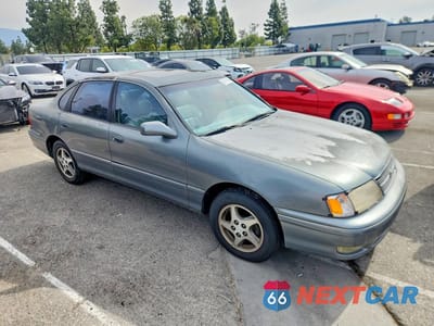 Czwarte zdjęcie samochodu z boku: 1999 TOYOTA AVALON XLS VIN:4T1BF18B4XU343041 - miniatura