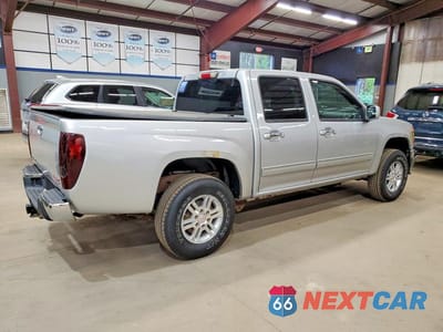 Trzecie zdjęcie samochodu z tyłu: 2012 GMC CANYON SLE VIN:1GTH6MFE0C8137151 - miniatura