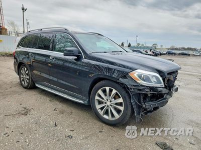 Czwarte zdjęcie samochodu z boku: 2014 MERCEDES-BENZ GL 450 4MATIC VIN:4JGDF7CE0EA416255 - miniatura