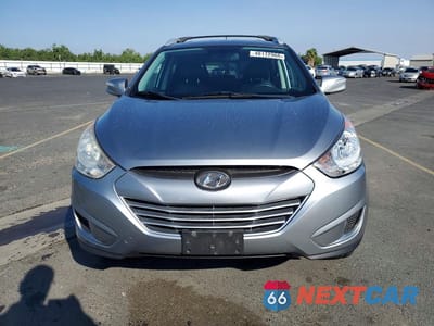 Piąte zdjęcie samochodu w środku: 2012 HYUNDAI TUCSON GLS VIN:KM8JUCAC3CU470566 - miniatura