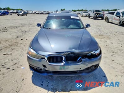 Piąte zdjęcie samochodu w środku: 2016 BMW 320 I VIN:WBA8E1G51GNU10179 - miniatura