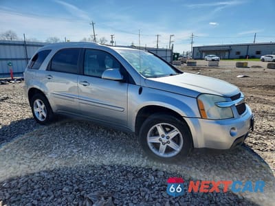 Czwarte zdjęcie samochodu z boku: 2006 CHEVROLET EQUINOX LT VIN:2CNDL73F566109230 - miniatura