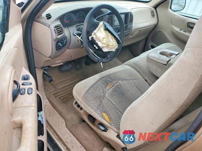 Zdjęcie 8 z 12 samochodu: 1999 FORD F150 VIN:1FTRX17L5XKB75254 - miniatura