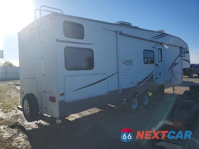 Czwarte zdjęcie samochodu z boku: 2007 KEYSTONE LAREDO CAMPER VIN:4YDF30B237L600064 - miniatura