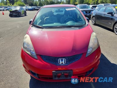 Piąte zdjęcie samochodu w środku: 2009 HONDA FIT VIN:JHMGE88239S031067 - miniatura
