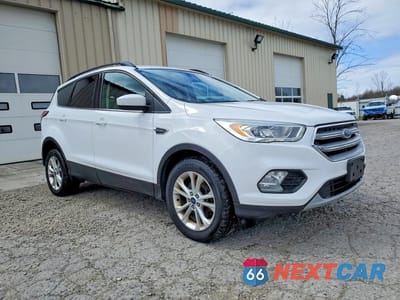Czwarte zdjęcie samochodu z boku: 2017 FORD ESCAPE SE VIN:1FMCU9GDXHUA37328 - miniatura