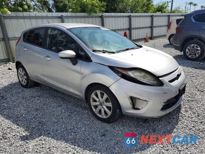 Czwarte zdjęcie samochodu z boku: 2012 FORD FIESTA SE VIN:3FADP4EJ3CM158216 - miniatura