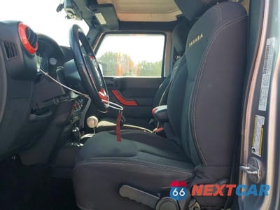Zdjęcie 7 z 12 samochodu: 2013 JEEP WRANGLER UNLIMITED SAHARA VIN:1C4BJWEG7DL662953 - miniatura