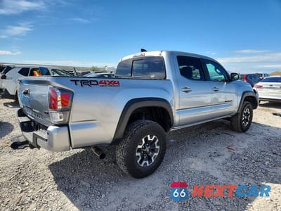 Trzecie zdjęcie samochodu z tyłu: 2022 TOYOTA TACOMA TRD OFF-ROAD VIN:3TMCZ5AN3NM491954 - miniatura