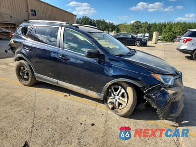 Czwarte zdjęcie samochodu z boku: 2018 TOYOTA RAV4 LE VIN:JTMZFREV0JJ724457 - miniatura