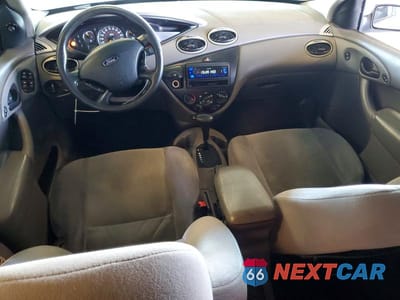 Zdjęcie 8 z 12 samochodu: 2002 FORD FOCUS SE VIN:1FAFP34312W172328 - miniatura