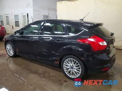 Drugie zdjęcie samochodu z przodu: 2013 FORD FOCUS TITANIUM VIN:1FADP3N24DL304015 - miniatura