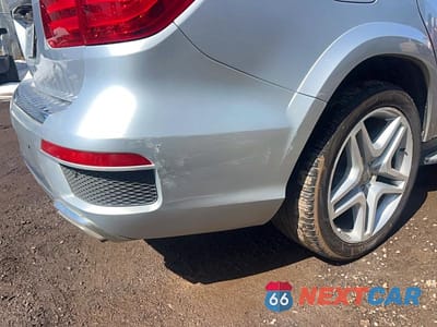 Zdjęcie 11 z 13 samochodu: 2013 MERCEDES-BENZ GL 550 4MATIC VIN:4JGDF7DE8DA124091 - miniatura