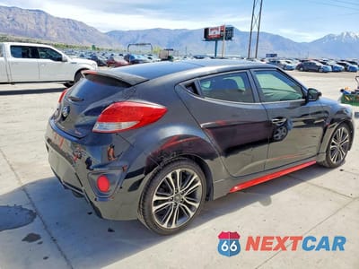 Trzecie zdjęcie samochodu z tyłu: 2016 HYUNDAI VELOSTER TURBO VIN:KMHTC6AE9GU255472 - miniatura