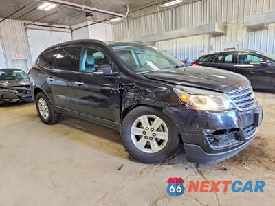 Czwarte zdjęcie samochodu z boku: 2014 CHEVROLET TRAVERSE LT VIN:1GNKVHKD1EJ137451 - miniatura