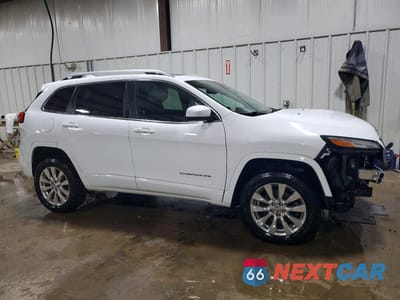 Czwarte zdjęcie samochodu z boku: 2017 JEEP CHEROKEE OVERLAND VIN:1C4PJMJS6HW509067 - miniatura