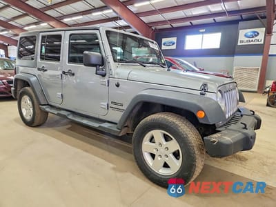 Czwarte zdjęcie samochodu z boku: 2013 JEEP WRANGLER UNLIMITED SPORT VIN:1C4BJWDGXDL699433 - miniatura