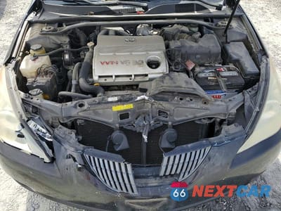 Zdjęcie 11 z 12 samochodu: 2006 TOYOTA CAMRY SOLARA SLE V6 VIN:4T1FA38PX6U090135 - miniatura
