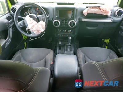 Zdjęcie 8 z 13 samochodu: 2016 JEEP WRANGLER UNLIMITED SAHARA VIN:1C4BJWEG3GL292346 - miniatura