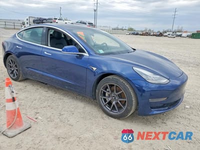 Czwarte zdjęcie samochodu z boku: 2019 TESLA MODEL 3 VIN:5YJ3E1EA9KF411858 - miniatura