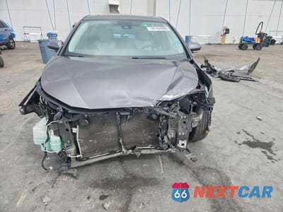 Piąte zdjęcie samochodu w środku: 2017 TOYOTA PRIUS THREE VIN:JTDKARFU0H3543492 - miniatura