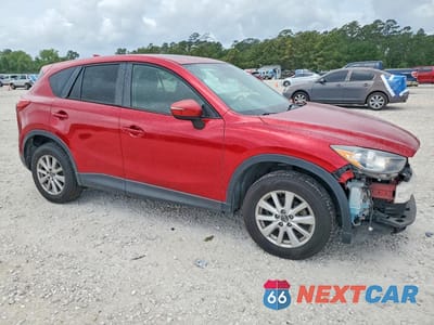 Czwarte zdjęcie samochodu z boku: 2016 MAZDA CX-5 TOURING VIN:JM3KE2CY2G0896634 - miniatura