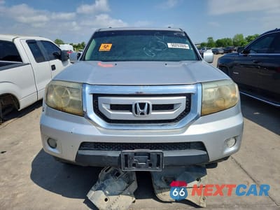 Piąte zdjęcie samochodu w środku: 2011 HONDA PILOT EXL VIN:5FNYF3H51BB009779 - miniatura