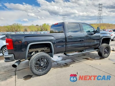 Trzecie zdjęcie samochodu z tyłu: 2015 GMC SIERRA K2500 SLE VIN:1GT12YE81FF129625 - miniatura