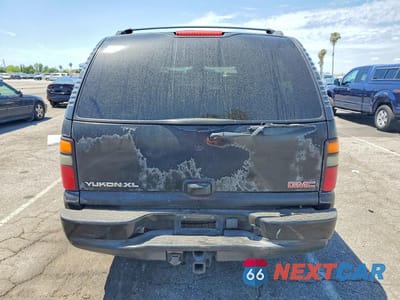 Zdjęcie 6 z 14 samochodu: 2005 GMC YUKON XL DENALI VIN:1GKFK66U25J115674 - miniatura