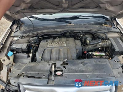 Zdjęcie 12 z 13 samochodu: 2006 HONDA PILOT VIN:5FNYF28516B046041 - miniatura