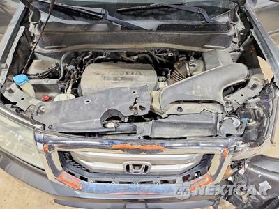 Zdjęcie 12 z 13 samochodu: 2010 HONDA PILOT EX VIN:5FNYF4H40AB038105 - miniatura