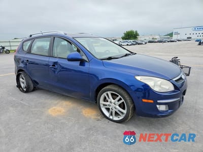 Czwarte zdjęcie samochodu z boku: 2012 HYUNDAI ELANTRA TOURING SE VIN:KMHDC8AE0CU136638 - miniatura
