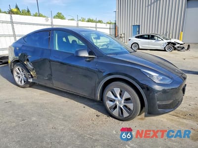 Czwarte zdjęcie samochodu z boku: 2023 TESLA MODEL Y VIN:7SAYGAEE7PF863093 - miniatura