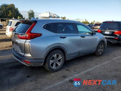 Trzecie zdjęcie samochodu z tyłu: 2018 HONDA CR-V LX VIN:2HKRW5H38JH415444 - miniatura