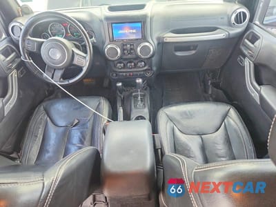 Zdjęcie 8 z 12 samochodu: 2014 JEEP WRANGLER UNLIMITED SAHARA VIN:1C4BJWEG9EL100473 - miniatura