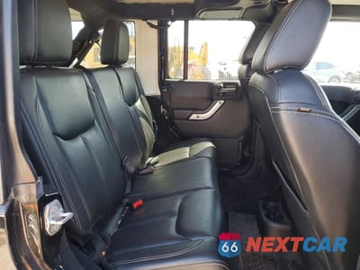 Zdjęcie 10 z 12 samochodu: 2015 JEEP WRANGLER UNLIMITED SAHARA VIN:1C4HJWEG3FL552656 - miniatura