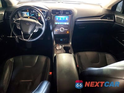 Zdjęcie 8 z 12 samochodu: 2020 FORD FUSION TITANIUM VIN:3FA6P0RU6LR182096 - miniatura